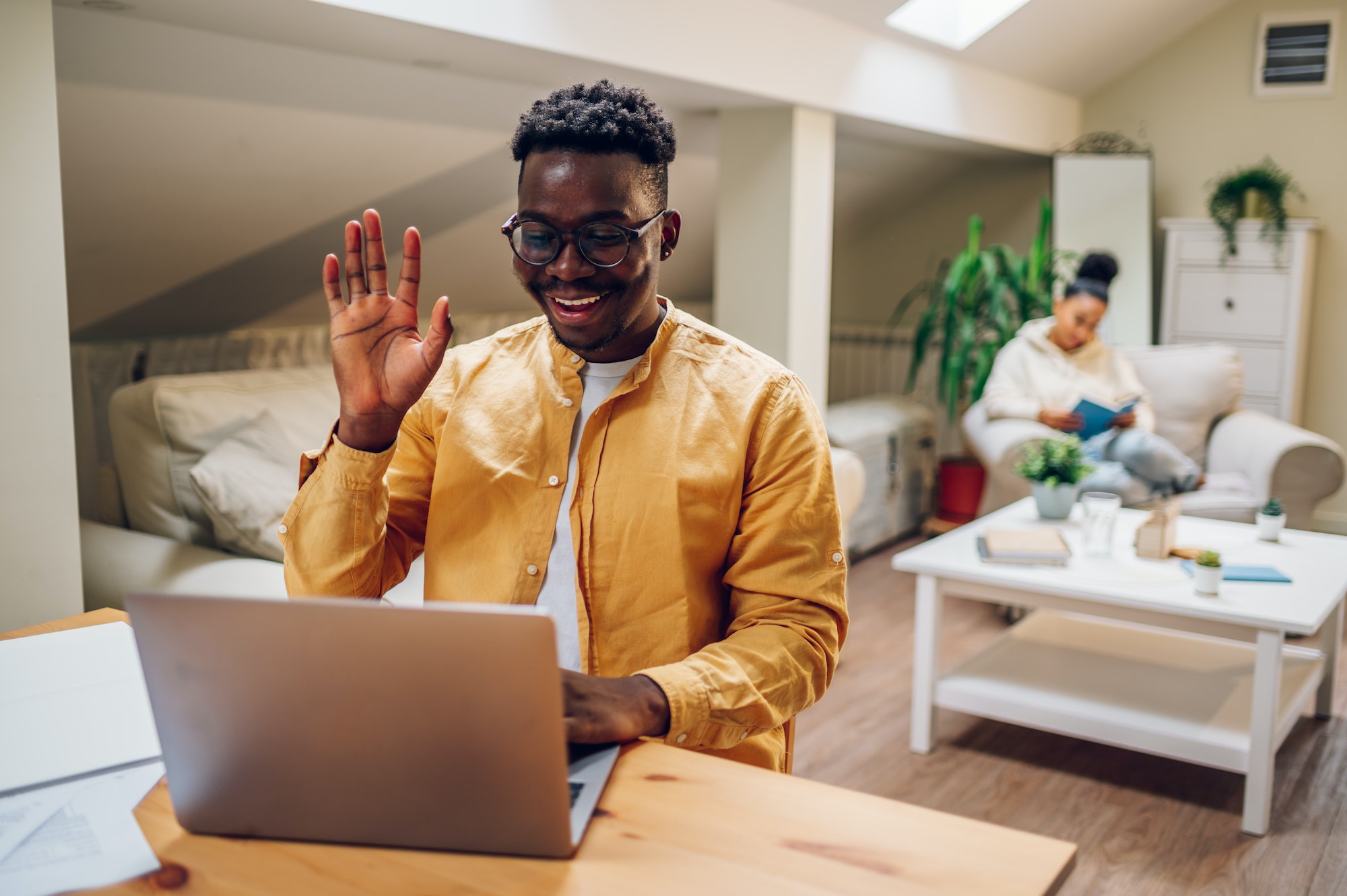 African american man using laptop for a video call at home